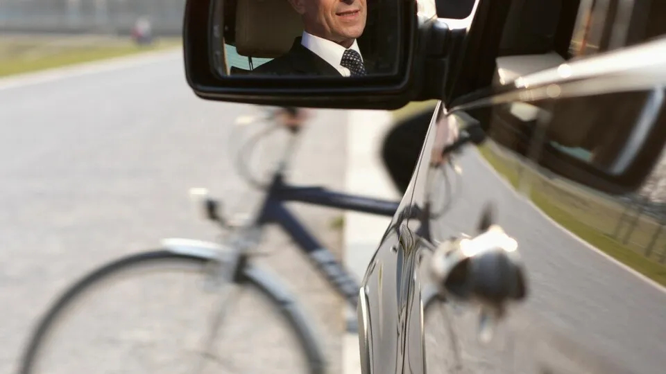 Germany --- Accident between car and cyclist --- Image by © RG Images/Stock4B/Corbis