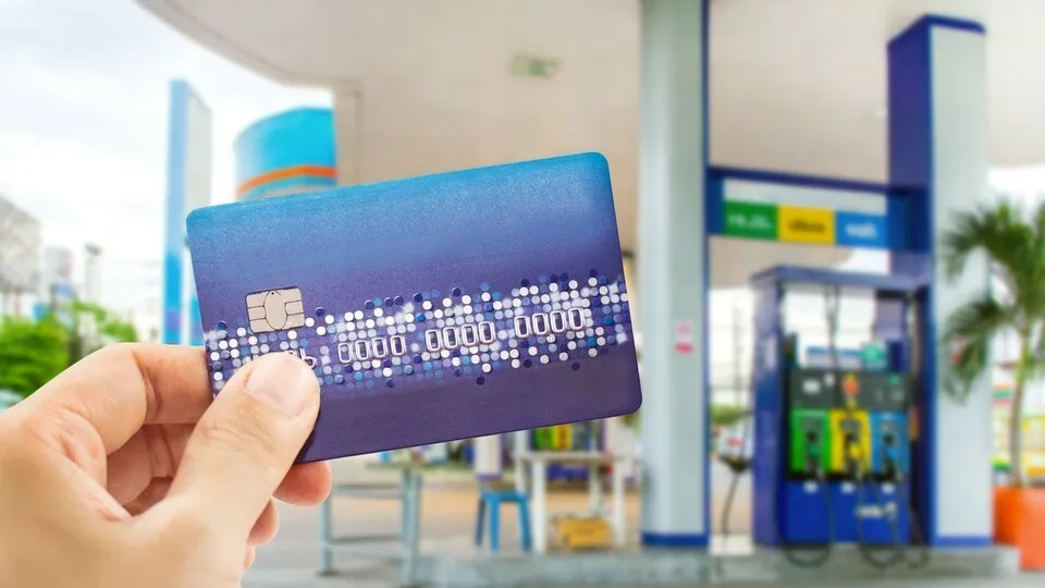 Credit card to make a payment for refueling car on gas station